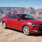 red Hyundai veloster with black performance graphics at the Grand Canyon